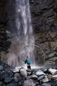 I'm in the waterfall Dancing in the waterfall framed by a cyr wheel