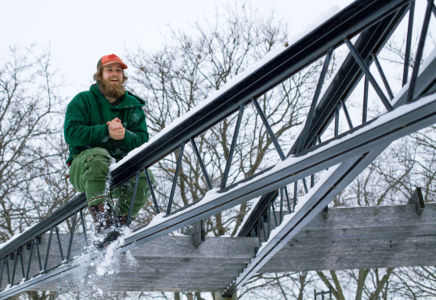 Taking a break on a beam Taking a break on a metal beam in the winter