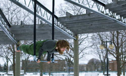 Trapeze Crocodile Guy doing the crocodile on a trapeze